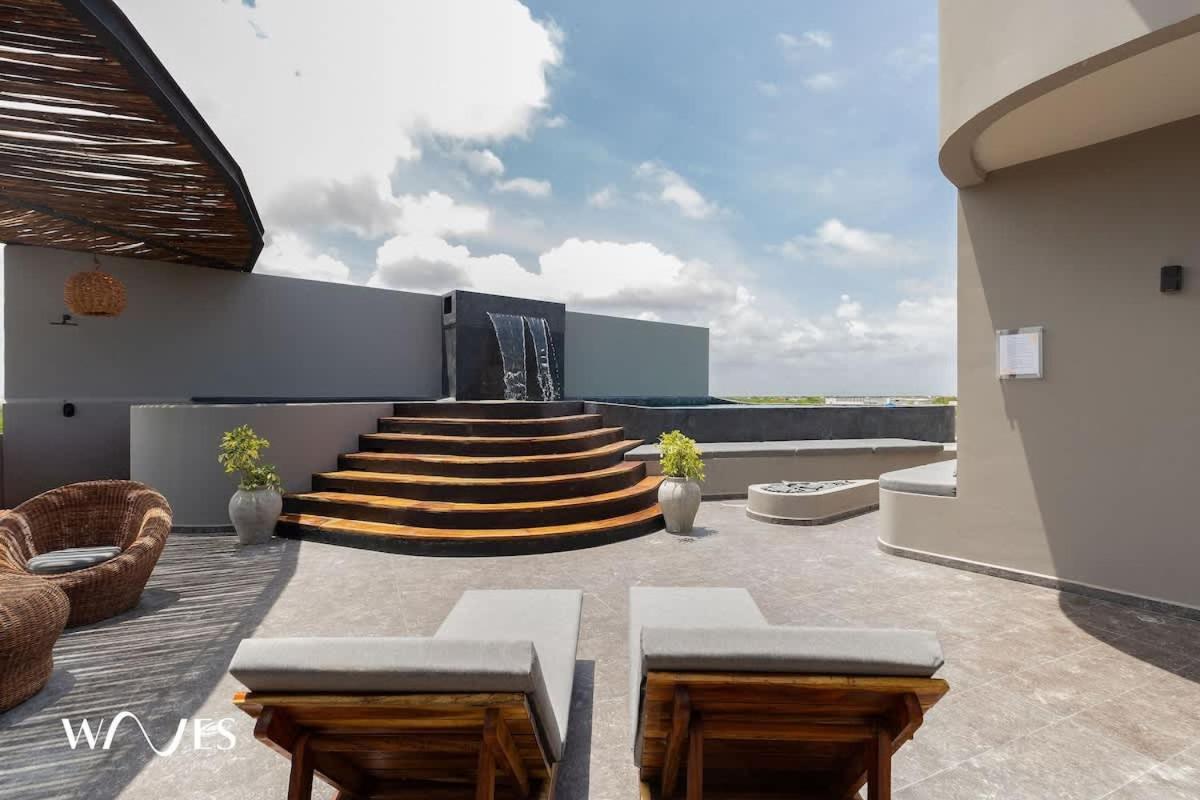 Holiday home Luminous 2 Bedroom With Roof Pool Close To Zone By Waves Management